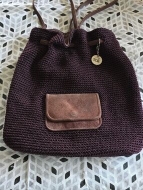 The Sak Plum Crochet Drawstring Backpack with Leather Trim